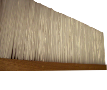 Wood brush, covered by polypropylene, manually stitched